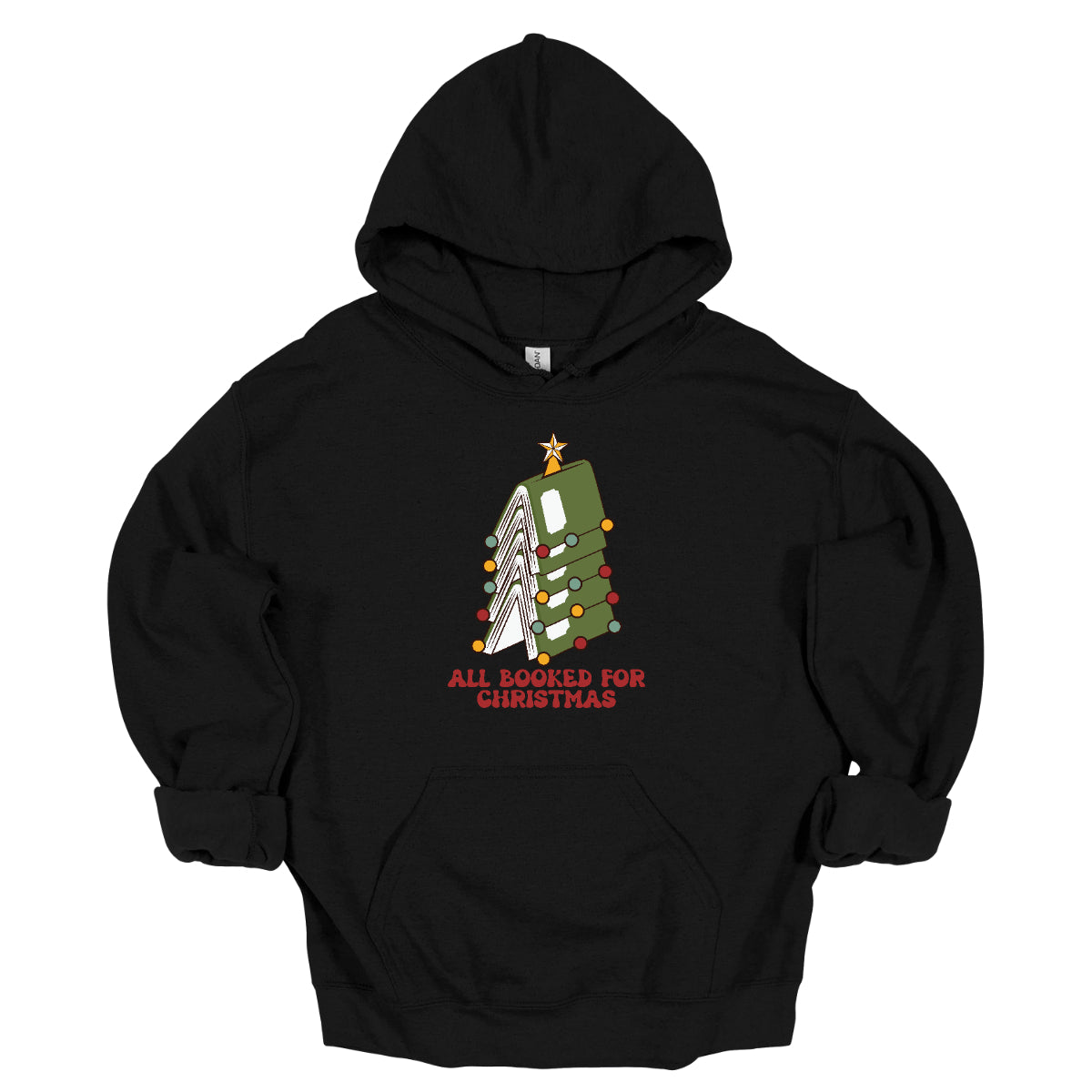 This whimsical t-shirt features the playful phrase "All Booked for Christmas" in a bold, red bubbly font that captures the festive spirit. Above the text, a delightful image showcases a stack of green books, artfully arranged to resemble a decorated Christmas tree. Shop Gorgeousware.com