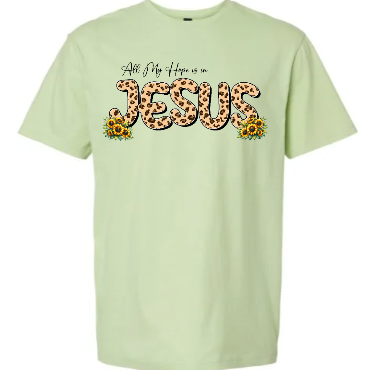 This shirt features the uplifting phrase "All My Hope is in Jesus" in a beautiful design. The text is written in elegant black script, with the word "Jesus" standing out in bold, bubble script, filled with a trendy animal print pattern in the middle. Surrounding the lettering are delicate, colorful flowers that frame the message, adding a touch of nature's beauty to the design. Shop Gorgeousware.com