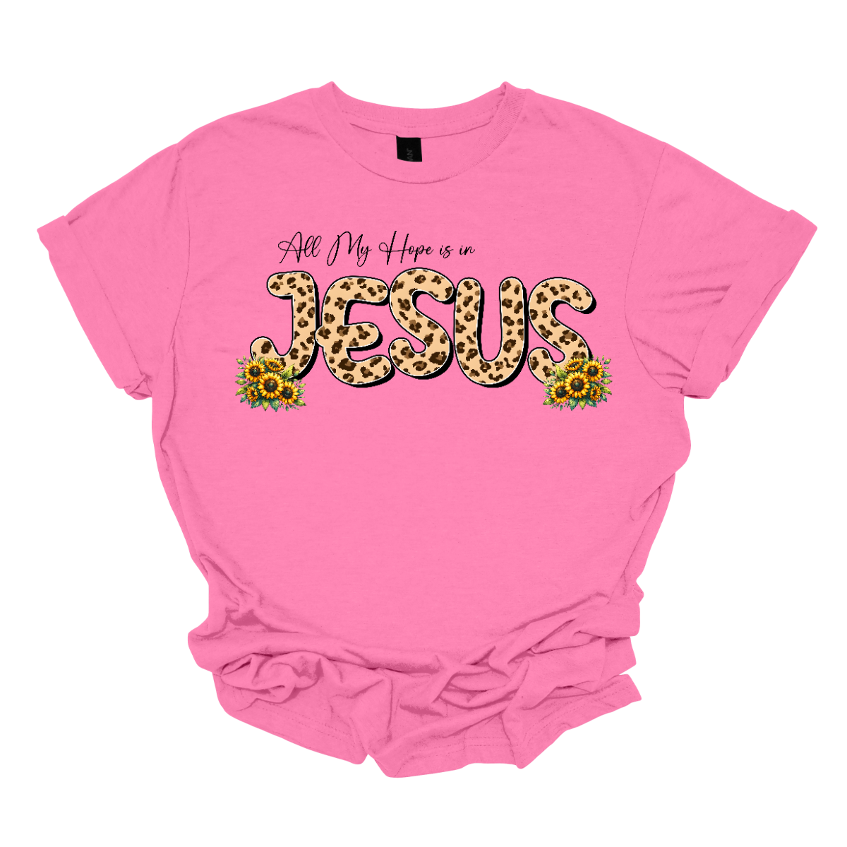 This shirt features the uplifting phrase "All My Hope is in Jesus" in a beautiful design. The text is written in elegant black script, with the word "Jesus" standing out in bold, bubble script, filled with a trendy animal print pattern in the middle. Surrounding the lettering are delicate, colorful flowers that frame the message, adding a touch of nature's beauty to the design. Shop Gorgeousware.com