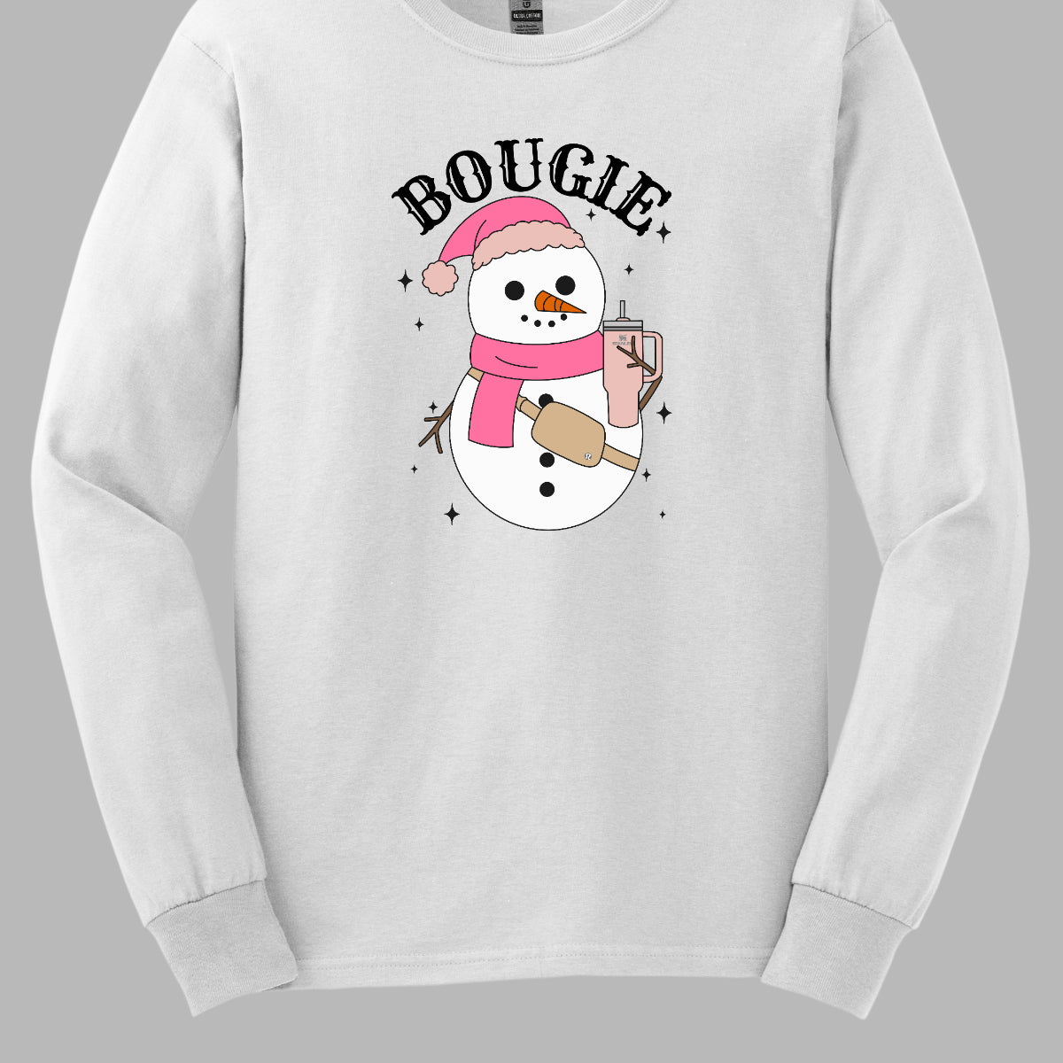 This chic t-shirt features the word "BOUGIE" in elegant, fancy lettering, capturing a stylish vibe. Beneath the text is a charming illustration of a snowman, decked out in a cute pink hat and scarf, exuding festive flair. The snowman is holding a pale pink Stanley cup, adding a trendy touch, while a beige Lululemon belt bag rests around its waist, complete with sparkles that catch the eye and enhance the glamorous theme. Shop Gorgeousware.com