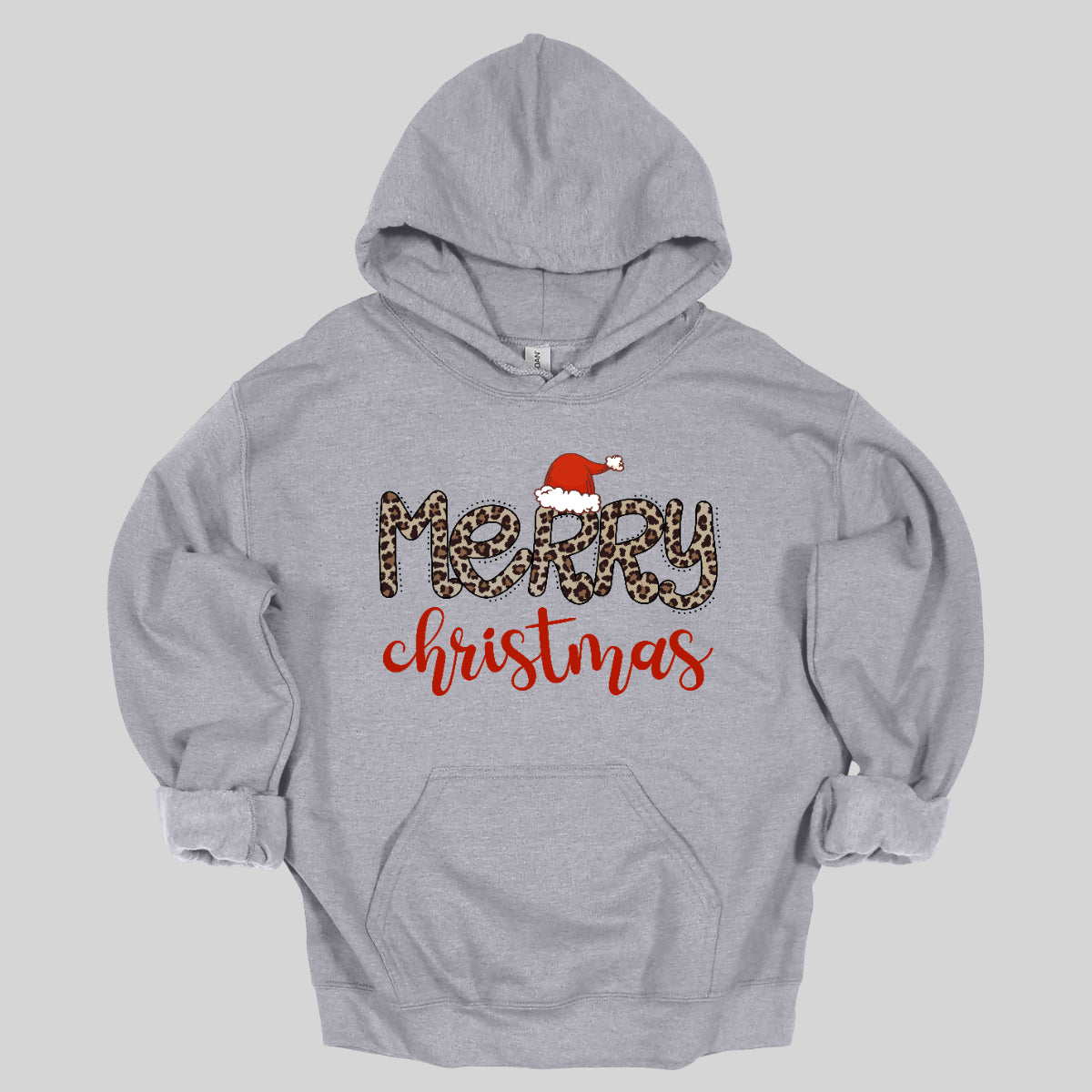 This festive t-shirt features the cheerful phrase "Merry Christmas." The word "Merry" is designed in a playful, bubbly font adorned with a fun cheetah print pattern, making it both eye-catching and stylish. The first "R" is topped with a whimsical Santa hat, adding a delightful holiday touch. Below, the word "Christmas" flows in a beautiful red cursive font, enhancing the festive spirit. This shirt is perfect for spreading holiday cheer with a fun and trendy twist! Shop Gorgeousware.com