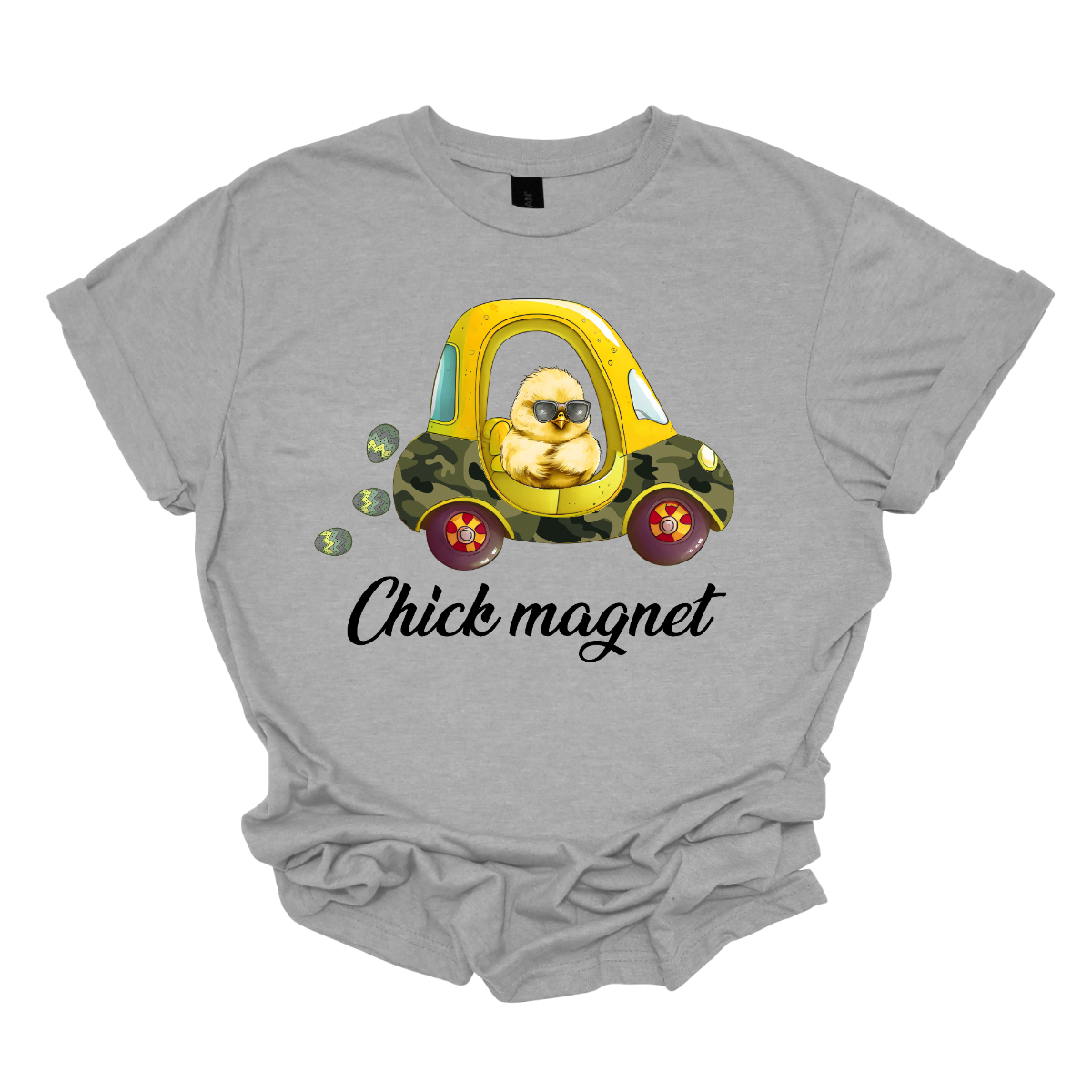 "Chick Magnet" - Drive into Easter with style in our adorable t-shirt featuring a charming little chick cruising in a cozy coupe, sunglasses on and a trail of Easter eggs in its wake. This playful design is sure to turn heads and spread smiles wherever you go, capturing the fun and excitement of the holiday season. Shop at Gorgeousware.com