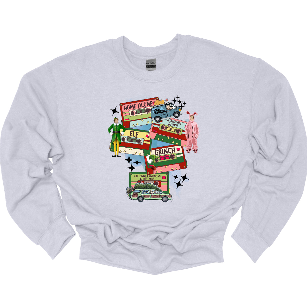 This design t-shirt showcases a nostalgic tribute to classic Christmas movies with a vibrant design featuring beloved characters. Each movie is represented by a unique cartoon illustration Home Alone, A Christmas Story, Elf, The Grinch, and Christmas Vacation. The colorful illustrations are framed by cassette tapes, adding a retro touch that evokes warm memories of holiday movie marathons. Shop Gorgeousware.com
