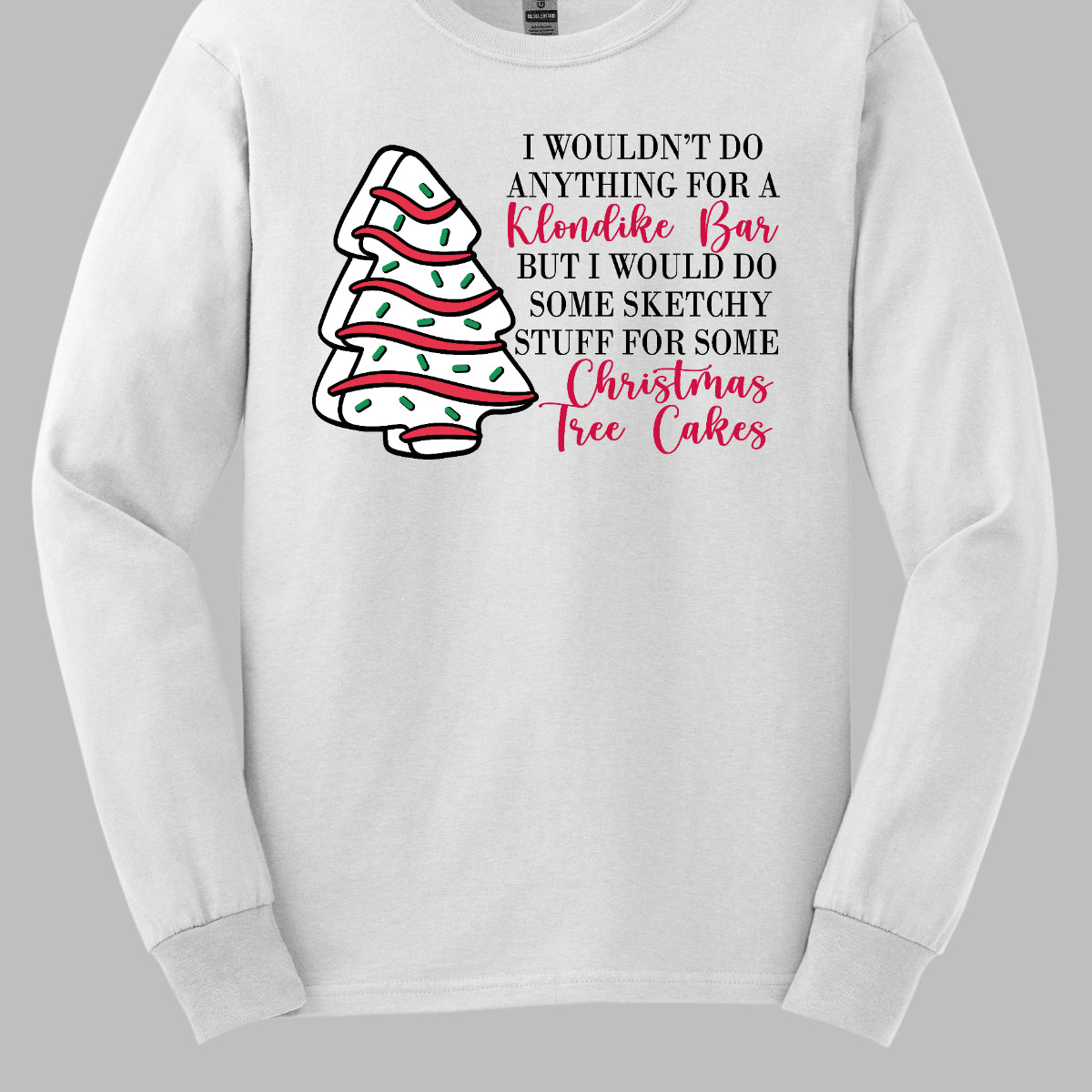 This fun t-shirt features a playful phrase: "I wouldn't do anything for a Klondike Bar but I would do some sketchy stuff for some Christmas Tree Cakes." The main text is presented in a sleek, professional black font, offering a clean contrast to the whimsical red cursive font used for "Klondike Bar" and "Christmas Tree Cakes," drawing attention to those key phrases. Shop Gorgeousware.com