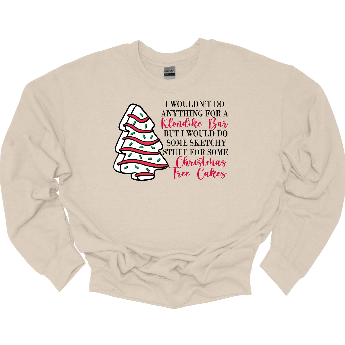 This fun t-shirt features a playful phrase: "I wouldn't do anything for a Klondike Bar but I would do some sketchy stuff for some Christmas Tree Cakes." The main text is presented in a sleek, professional black font, offering a clean contrast to the whimsical red cursive font used for "Klondike Bar" and "Christmas Tree Cakes," drawing attention to those key phrases. Shop Gorgeousware.com