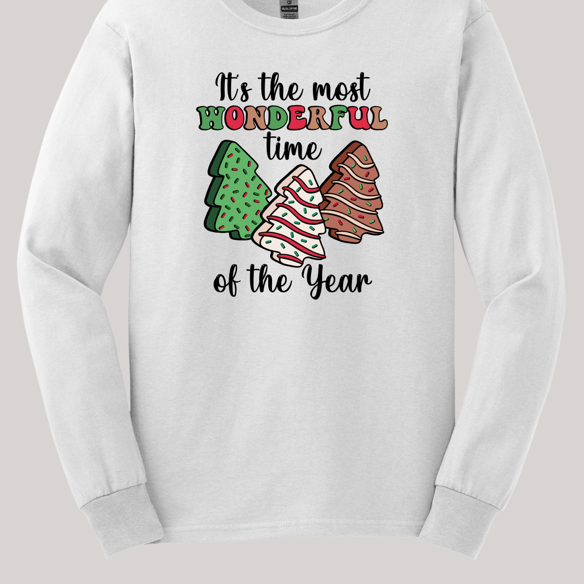 This festive t-shirt features the phrase "It's the most wonderful time of the year" in a stylish black cursive font, creating an elegant backdrop for the holiday message. The word "wonderful" stands out in a playful bubbly font that alternates between vibrant green, cheerful red, and warm brown, adding a whimsical touch. Shop Gorgeousware.com