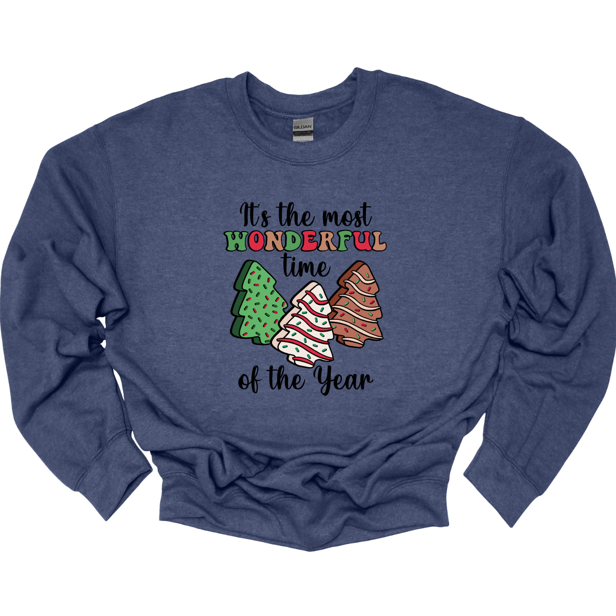 This festive t-shirt features the phrase "It's the most wonderful time of the year" in a stylish black cursive font, creating an elegant backdrop for the holiday message. The word "wonderful" stands out in a playful bubbly font that alternates between vibrant green, cheerful red, and warm brown, adding a whimsical touch. Shop Gorgeousware.com