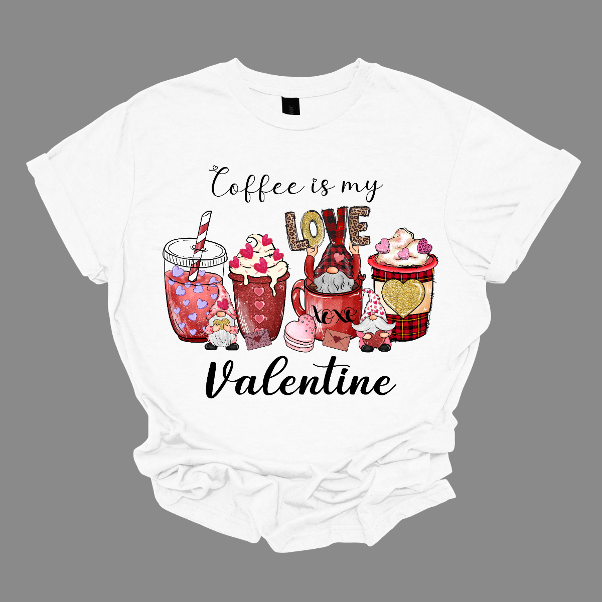 Introducing our "Coffee Is My Valentine" T-shirt featuring charming gnomes – a delightful and whimsical garment for those who've found true love in a cup of coffee. This shirt is a playful celebration of the bond between coffee lovers and their beloved brew, with the added charm of adorable gnomes. The design showcases enchanting gnomes enjoying their coffee, creating a heartwarming scene that captures the joy and affection coffee brings into our lives. Shop at Gorgeousware.com