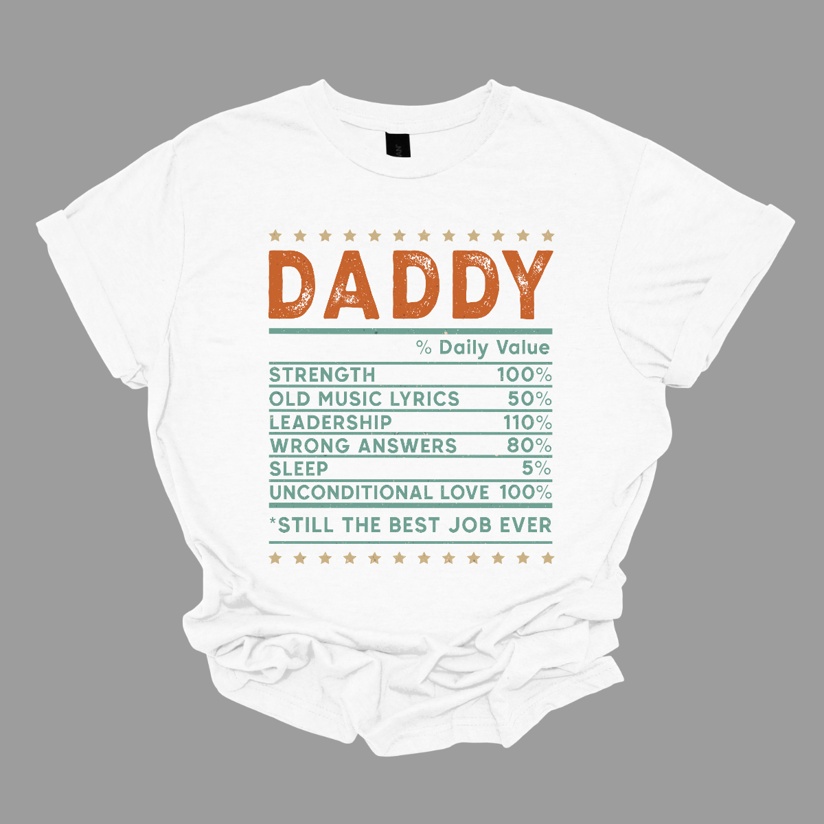 This charming "Daddy Daily Value" shirt is the perfect blend of humor and heart for every dad on the go. Featuring a playful nutrition label, it lists all the essential ingredients that make dad life extra special—like strength, old music lyrics, wrong answers, sleep %, and unconditional love. Color palette of Orange and blue-green font, Shop Gorgeousware.com