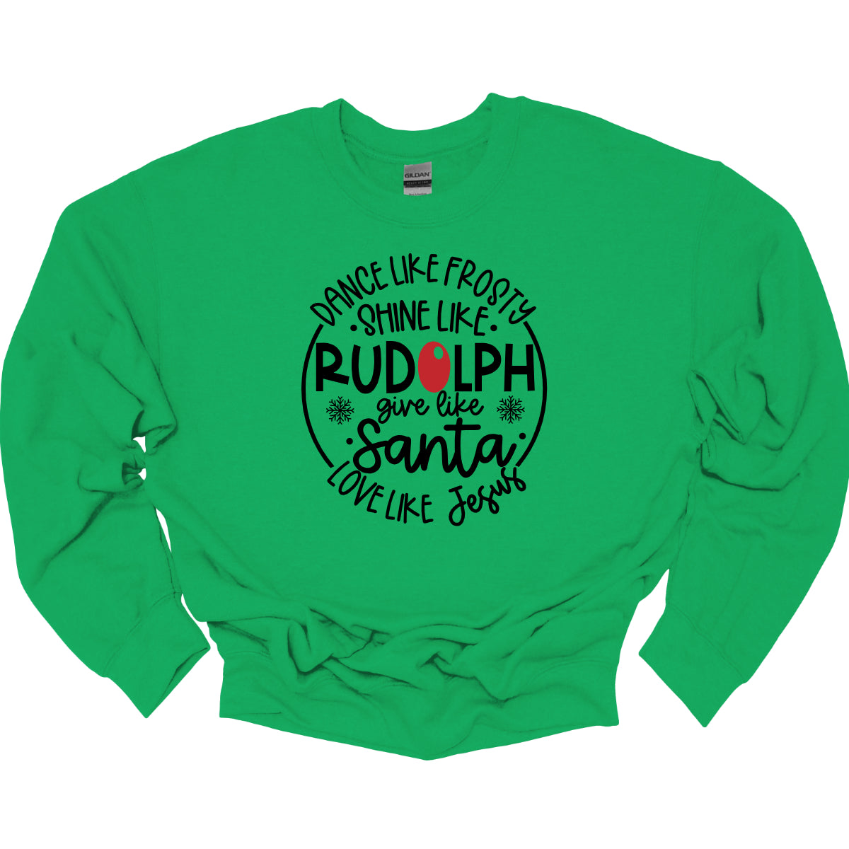 This heartwarming t-shirt features the uplifting phrase "Dance like Frosty, shine like Rudolph, give like Santa, love like Jesus" arranged in an array of stylish black fonts that create a dynamic and eye-catching design. The “O” in "Rudolph" is playfully highlighted in red, resembling his famous nose, adding a festive touch to the overall look. Shop Gorgeousware.com