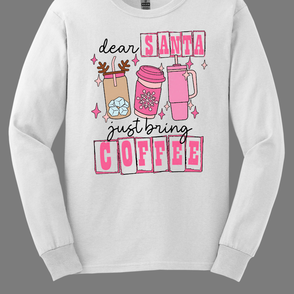 holiday season isn't complete without a little caffeine boost! The design features the cheeky phrase, "Dear Santa, Just bring coffee", in bold, fun lettering. The words "Santa" and "coffee" are highlighted with hot pink block-outlined boxes, adding a pop of color and flair to the design. Shop at Gorgeousware.com