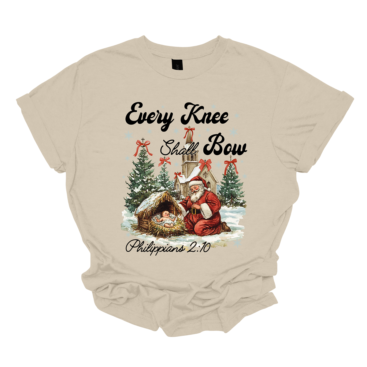 This festive and powerful apparel design features the phrase "Every Knee Shall Bow" in bold, elegant lettering, symbolizing the reverence and humility of the Christmas story. The artwork showcases Santa Claus, traditionally known for his joyful spirit, bowing down in awe before a humble manger that cradles baby Jesus. In the background, an old chapel stands as a symbol of faith, with evergreen trees adorned with festive bows, adding a touch of seasonal beauty and serenity. Shop at Gorgeousware.com