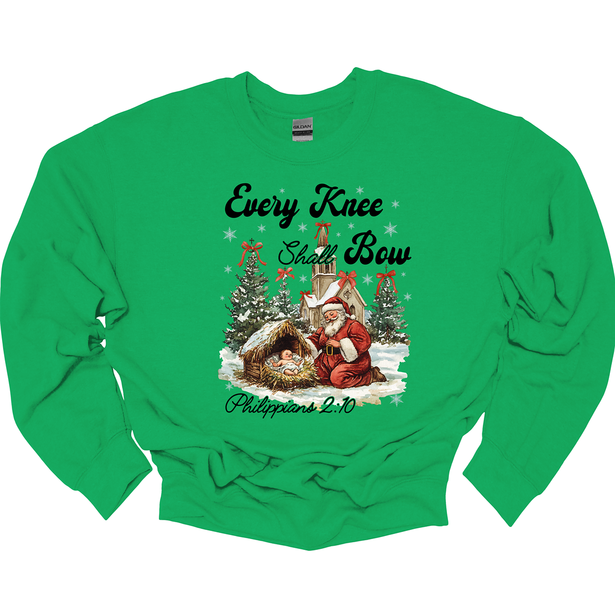 This festive and powerful apparel design features the phrase "Every Knee Shall Bow" in bold, elegant lettering, symbolizing the reverence and humility of the Christmas story. The artwork showcases Santa Claus, traditionally known for his joyful spirit, bowing down in awe before a humble manger that cradles baby Jesus. In the background, an old chapel stands as a symbol of faith, with evergreen trees adorned with festive bows, adding a touch of seasonal beauty and serenity. Shop at Gorgeousware.com