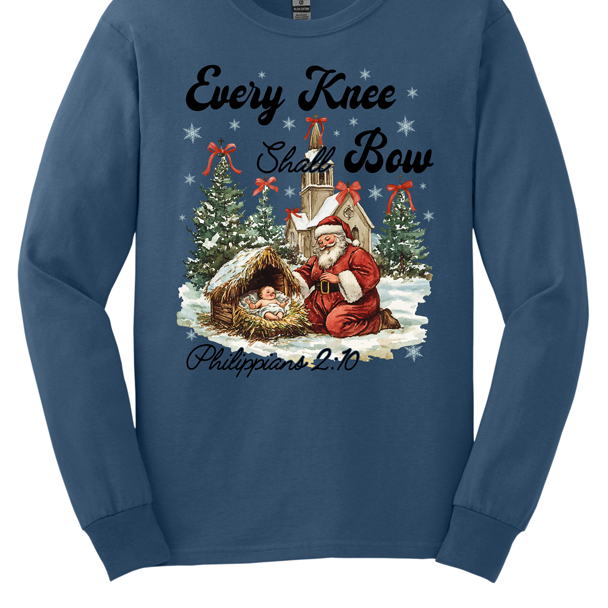 This festive and powerful apparel design features the phrase "Every Knee Shall Bow" in bold, elegant lettering, symbolizing the reverence and humility of the Christmas story. The artwork showcases Santa Claus, traditionally known for his joyful spirit, bowing down in awe before a humble manger that cradles baby Jesus. In the background, an old chapel stands as a symbol of faith, with evergreen trees adorned with festive bows, adding a touch of seasonal beauty and serenity. Shop at Gorgeousware.com