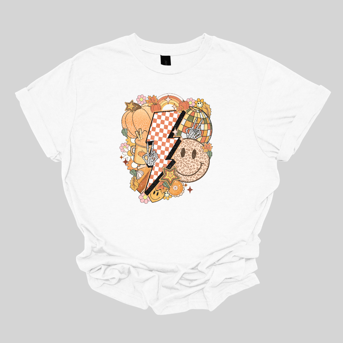 This t-shirt is a vibrant, retro-inspired celebration of eclectic autumn vibes. At its center is a bold, large lightning bolt styled in a striking pink and white checkerboard pattern, immediately capturing attention with its energetic and nostalgic flair. Shop Gorgeousware.com