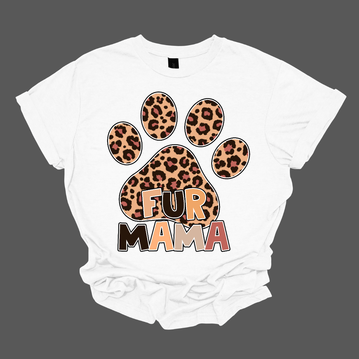 The "Fur Mama" shirt design features a bold and eye-catching large paw print as the central element. Inside the paw print, a stylish animal print pattern adds a wild and trendy touch.
The phrase "Fur Mama" is written in warm, inviting lettering, using block letter font. Shop Gorgeouseware.com