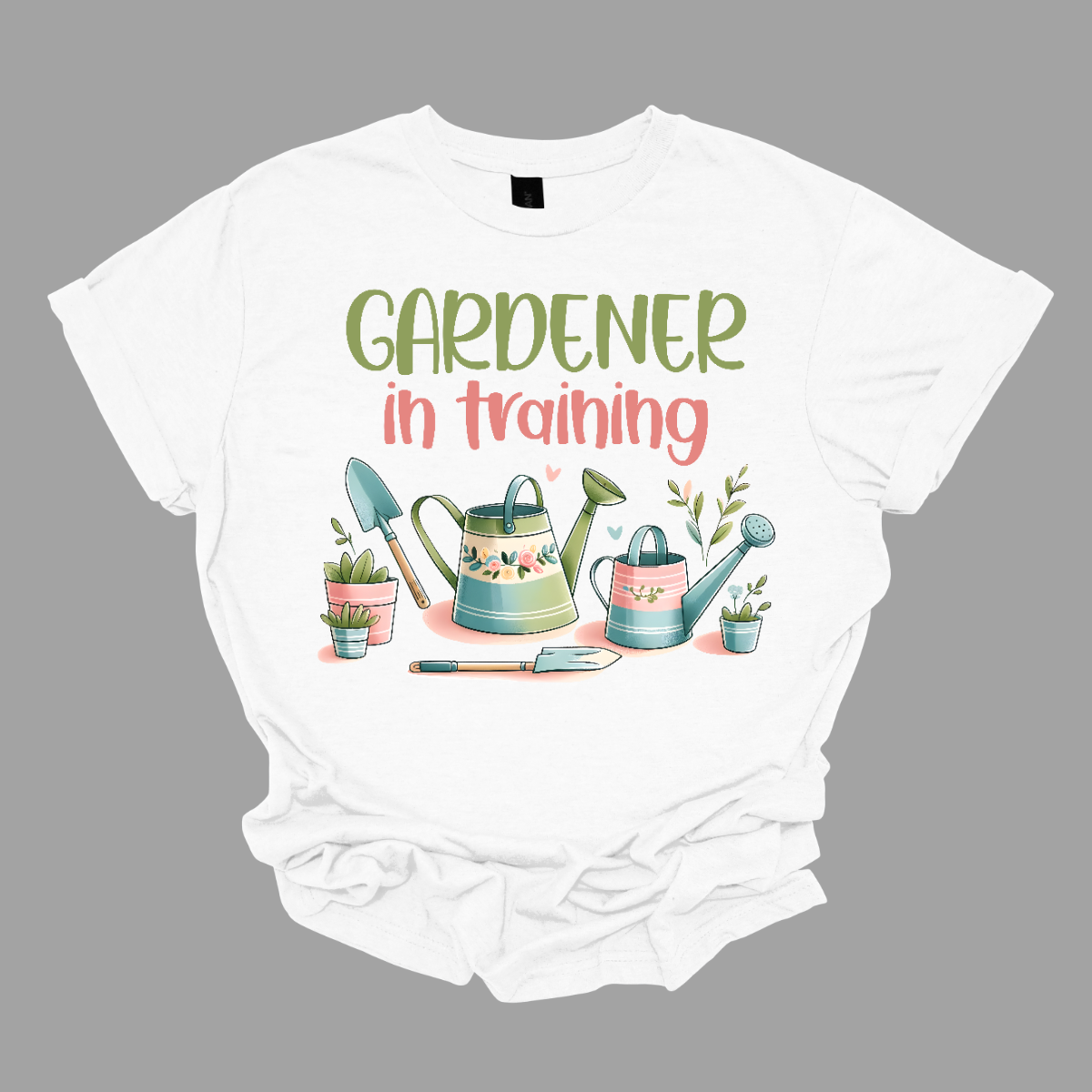 This adorable "Gardener In Training" shirt is perfect for little green thumbs! Featuring a fun, colorful design, it lets everyone know that your child is ready to dig, plant, and grow their way to gardening greatness. With its playful message and soft, comfortable fabric, this shirt is perfect for outdoor adventures, school activities, or helping out in the garden. A great gift for aspiring gardeners who are eager to get their hands dirty! Shop Gorgeouseware.com