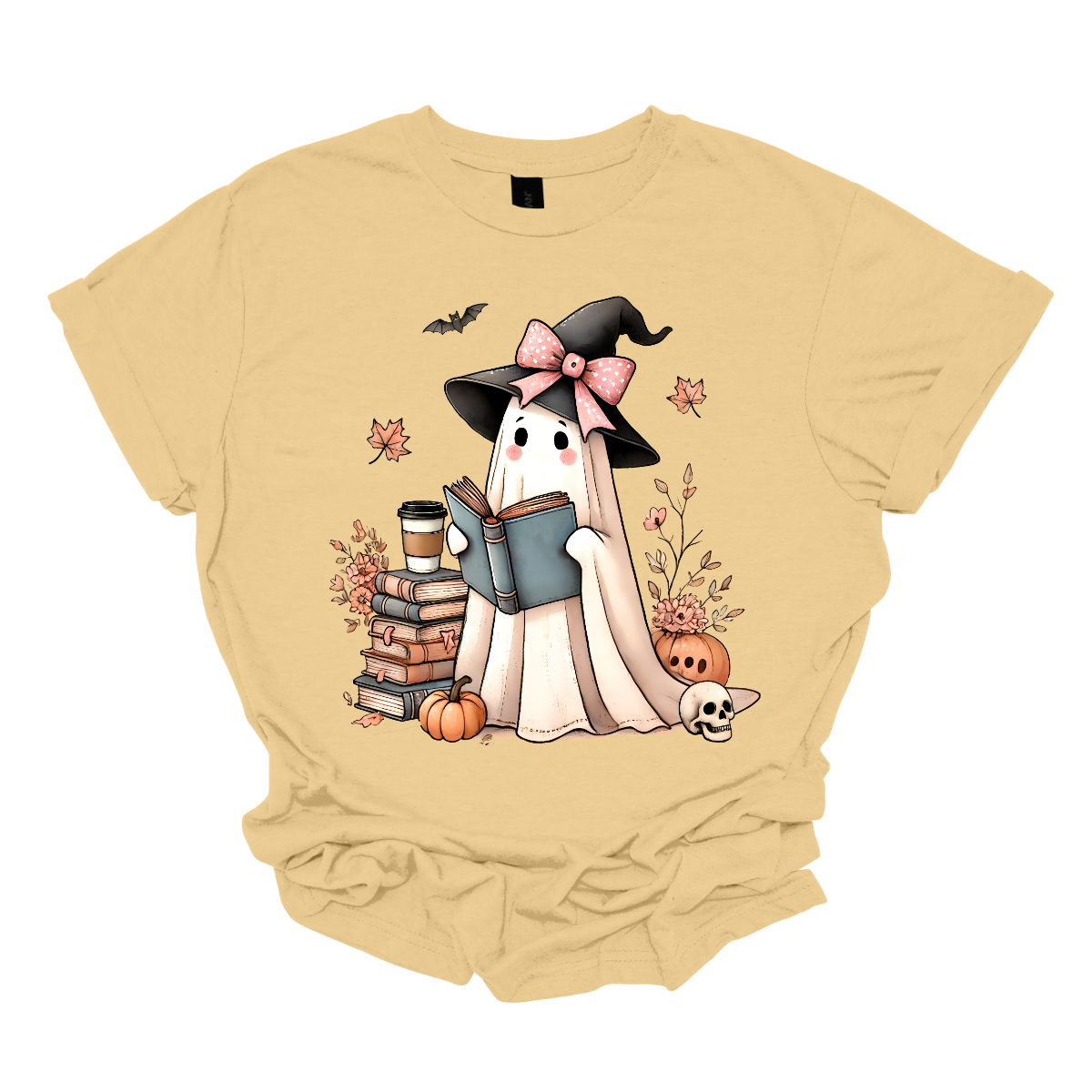 This T-shirt features an adorable ghost wearing a witch's hat adorned with a pink bow. The ghost has a warm, friendly expression as she enjoys her coffee, with a stack of books by her side.  Around her, small pumpkins are scattered on the ground, adding a cozy, autumnal vibe. The design perfectly captures the charm of the Halloween season with a cute and whimsical twist. Shop at Gorgeousware.com