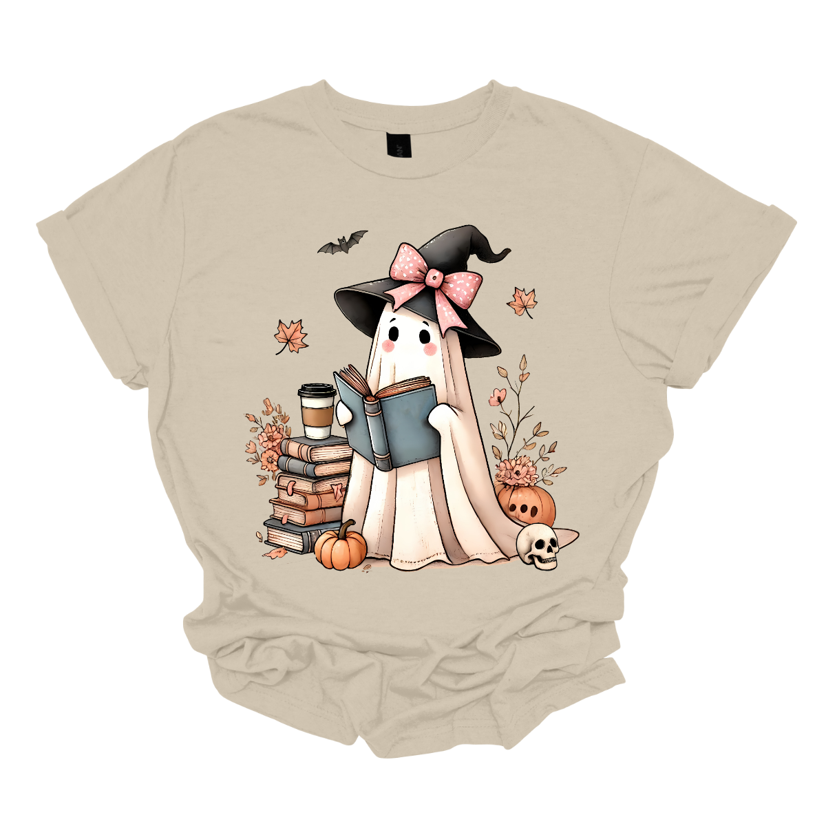 This T-shirt features an adorable ghost wearing a witch's hat adorned with a pink bow. The ghost has a warm, friendly expression as she enjoys her coffee, with a stack of books by her side.  Around her, small pumpkins are scattered on the ground, adding a cozy, autumnal vibe. The design perfectly captures the charm of the Halloween season with a cute and whimsical twist. Shop at Gorgeousware.com