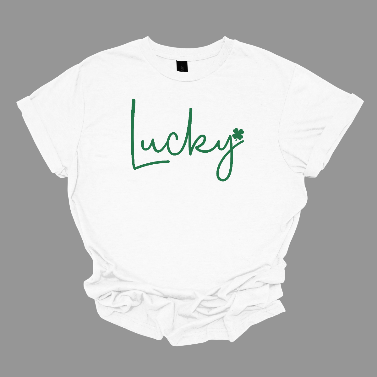 ☘️ Get Lucky this St. Patrick's Day with our Shamrock Tee! ☘️ Embrace the spirit of the Irish and celebrate St. Patrick's Day in style with our simple yet charming "Lucky" T-shirt. Featuring a vibrant green word that exudes luck and a small shamrock at the end, this tee is the perfect way to add a touch of festive cheer to your wardrobe. Shop at Gorgeousware.com today!