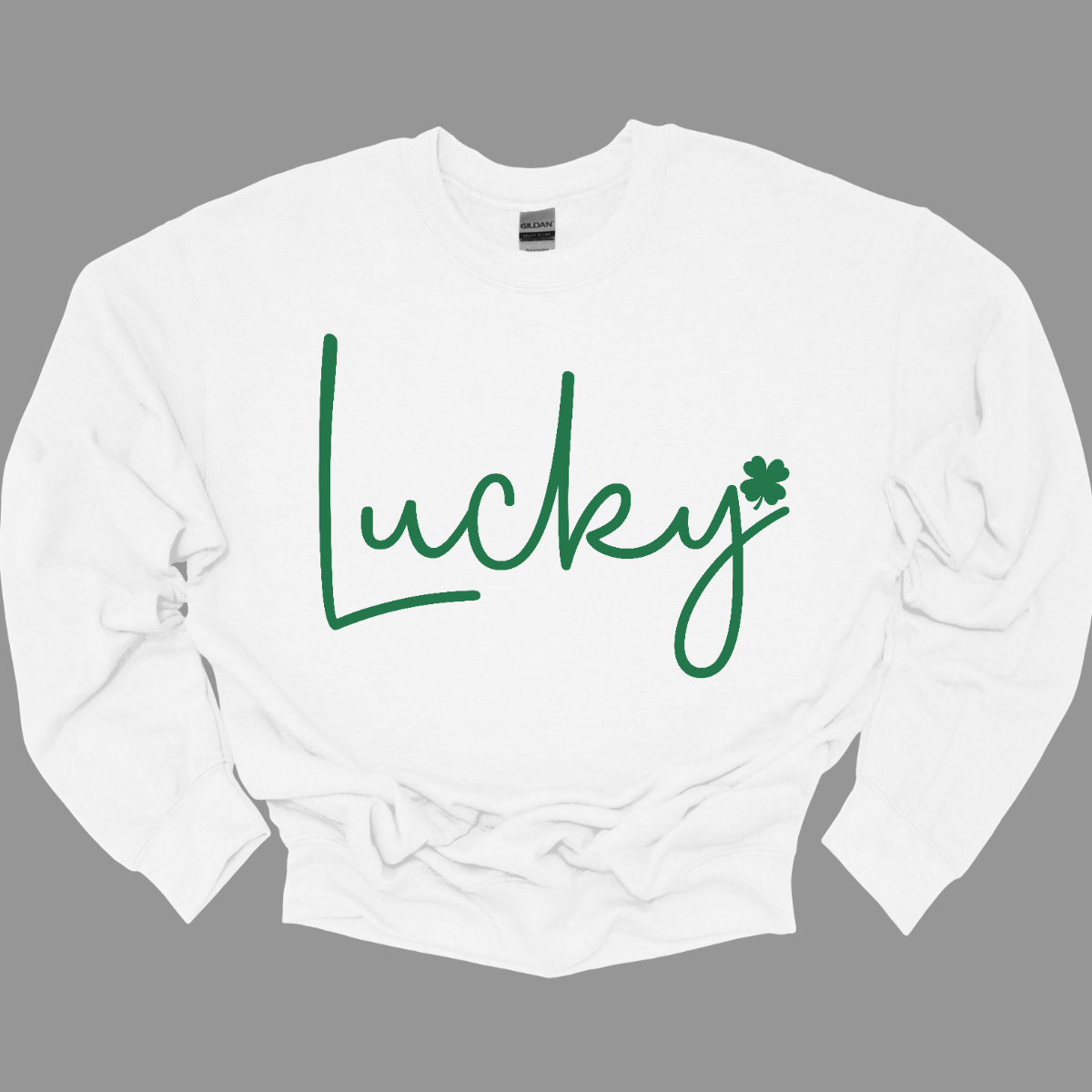 ☘️ Get Lucky this St. Patrick's Day with our Shamrock Tee! ☘️ Embrace the spirit of the Irish and celebrate St. Patrick's Day in style with our simple yet charming "Lucky" T-shirt. Featuring a vibrant green word that exudes luck and a small shamrock at the end, this tee is the perfect way to add a touch of festive cheer to your wardrobe. Shop at Gorgeousware.com today!