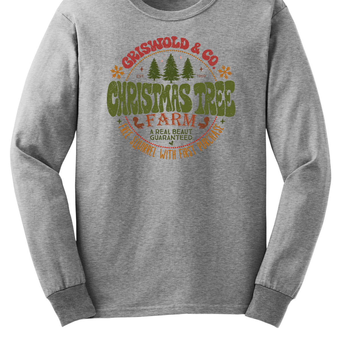 This festive t-shirt captures the spirit of holiday fun with a design inspired by classic Christmas cheer. The shirt features the words “Christmas Tree Farm” prominently displayed, with “Christmas Tree” in vibrant green bubble letters that pop with playful energy.Encircling this central text is “Griswold & CO.,” giving it a nostalgic nod to the iconic family from holiday movie lore. Surrounding the main text are memorable quotes from the movie. Shop Gorgeousware.com
