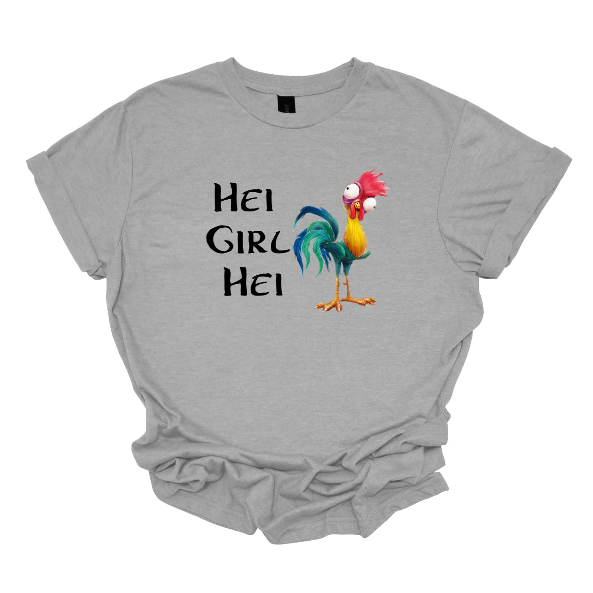 This t-shirt features a playful and vibrant design with the phrase "Hei Girl Hei" emblazoned in a lively, cartoonish black font that adds a fun and energetic touch. The words are arranged in a way that captures attention and conveys a cheerful message. Next to the text is the charming cartoon character Hei Hei from Disney's Moana. Hei Hei is depicted with his usual goofy expression and colorful plumage, bringing a whimsical and endearing element to the design. Shop Gorgeousware.com