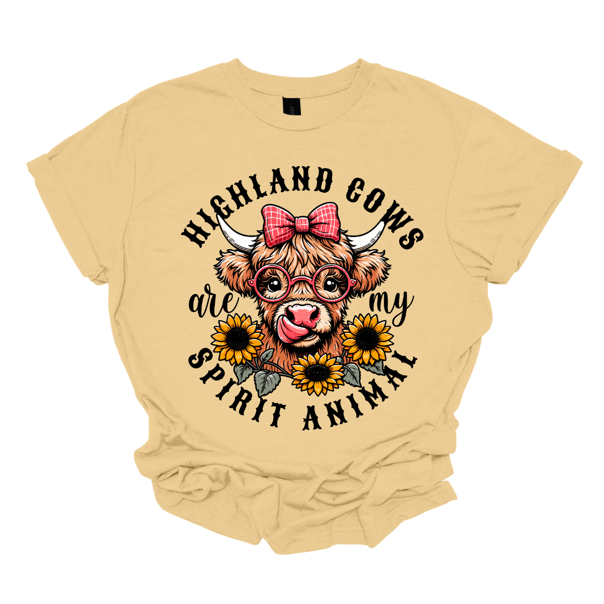 This shirt showcases a delightful Highland cow, complete with a cute bow on its head and stylish glasses, radiating charm and personality. Beneath the cow, a lovely arrangement of yellow daisies creates a soft, floral touch, adding a pop of color and whimsy to the design. The phrase "Highland Cows are my spirit animal" is playfully displayed, capturing the cow's spirit and the wearer's connection to these unique creatures. Shop Gorgeouseware.com