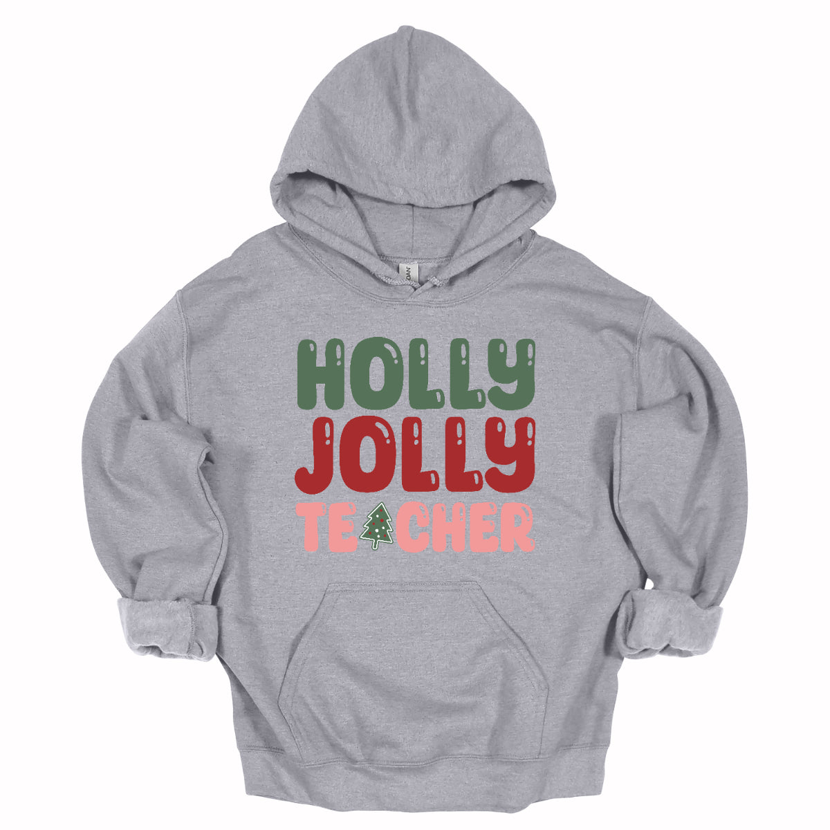 This festive t-shirt features the cheerful phrase "Holly Jolly Teacher" in a delightful bubbly font with fun cut-outs that add a playful touch. The word "Holly" is presented in a vibrant green, evoking the essence of holiday greenery, while "Jolly" pops in a bright red, radiating festive cheer. The word "Teacher" is in a cheerful pink, providing a lovely contrast. A whimsical twist comes with the letter "A" in "Teacher," which is creatively transformed into a charming Christmas tree. Shop Gorgeousware.com