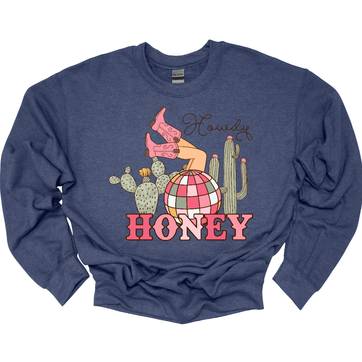 Introducing our "Howdy Honey" T-shirt – a dazzling and charming garment that brings together Western flair and a touch of disco glamour. This shirt features delightful elements such as cowgirl boots, cactuses, and a vibrant pink and white disco ball, creating a unique fusion of country and disco aesthetics.  Adorning the T-shirt are stylish cowgirl boots, adding a Western charm, and cactuses that bring a hint of desert landscape. Shop at Gorgeousware.com