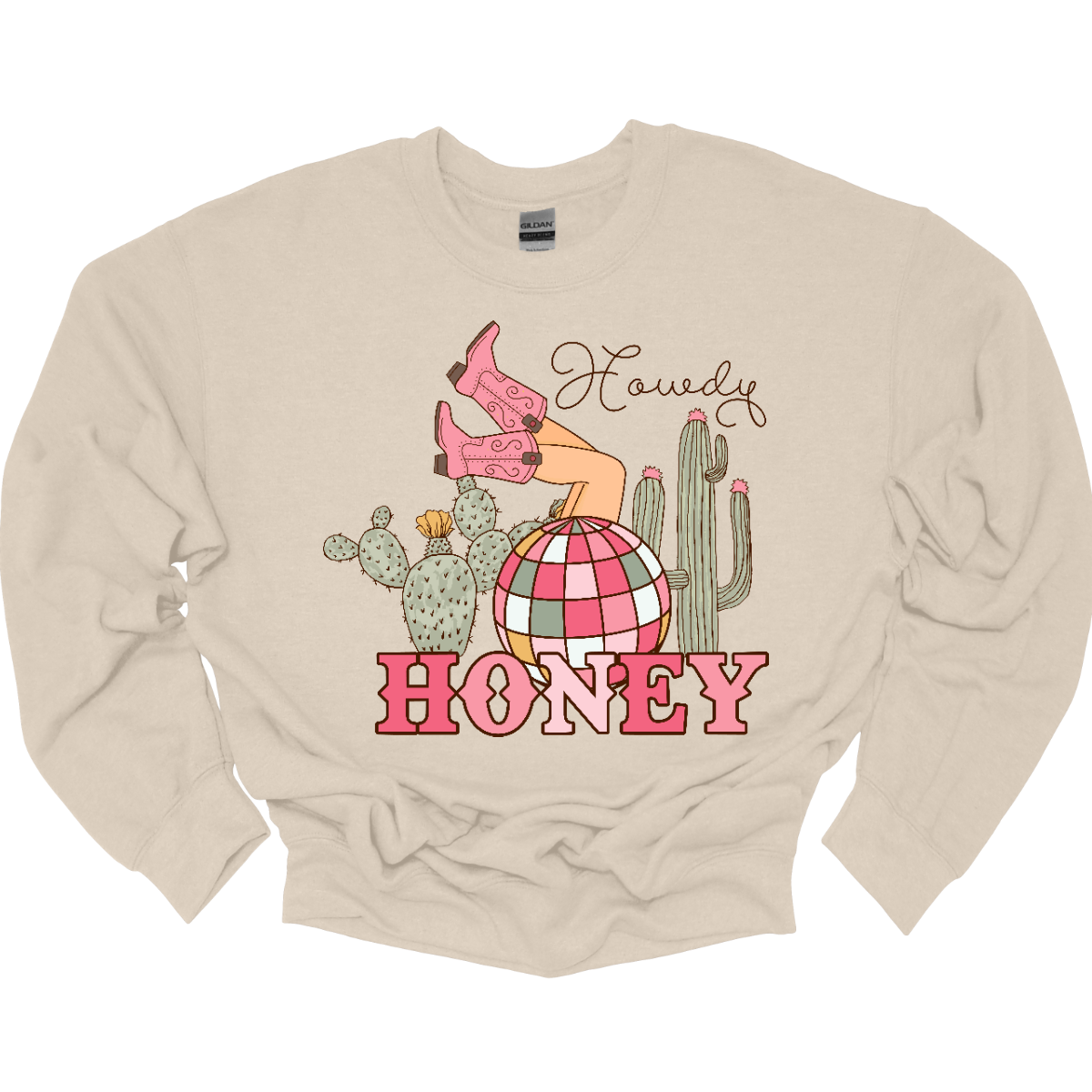 Introducing our "Howdy Honey" T-shirt – a dazzling and charming garment that brings together Western flair and a touch of disco glamour. This shirt features delightful elements such as cowgirl boots, cactuses, and a vibrant pink and white disco ball, creating a unique fusion of country and disco aesthetics. Adorning the T-shirt are stylish cowgirl boots, adding a Western charm, and cactuses that bring a hint of desert landscape. Shop at Gorgeousware.com