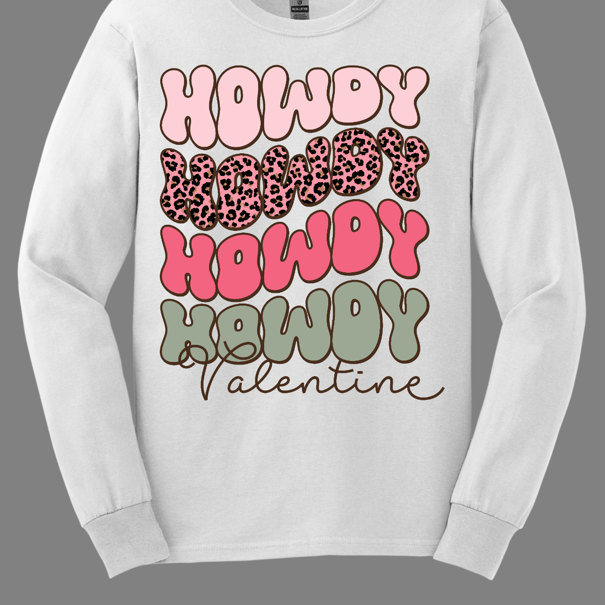 Introducing our "Howdy Valentine" T-shirt – a retro-inspired masterpiece that adds a touch of vintage charm to your Valentine's Day celebration. This shirt features a stylish retro font in soft pinks and sage colors, creating a delightful and nostalgic vibe perfect for expressing love with a Western twist. The phrase "Howdy Valentine" is elegantly displayed in a retro font, evoking the classic aesthetics of bygone eras. Shop at Gorgeousware.com