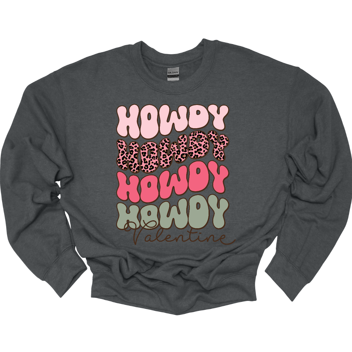 Introducing our "Howdy Valentine" T-shirt – a retro-inspired masterpiece that adds a touch of vintage charm to your Valentine's Day celebration. This shirt features a stylish retro font in soft pinks and sage colors, creating a delightful and nostalgic vibe perfect for expressing love with a Western twist. The phrase "Howdy Valentine" is elegantly displayed in a retro font, evoking the classic aesthetics of bygone eras. Shop at Gorgeousware.com