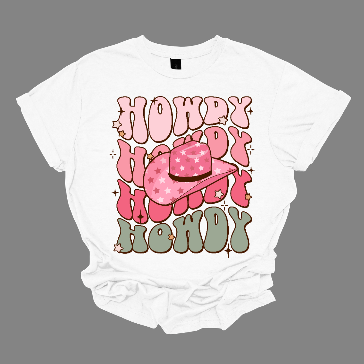 Introducing our "Howdy" T-shirt – a retro-inspired delight that captures the essence of Western charm with a stylish twist. The retro font adds a touch of nostalgia, evoking the classic aesthetics of yesteryears. The prominent cowgirl hat in the middle becomes a focal point, bringing a Western flair to the design. Shop at Gorgeousware.com