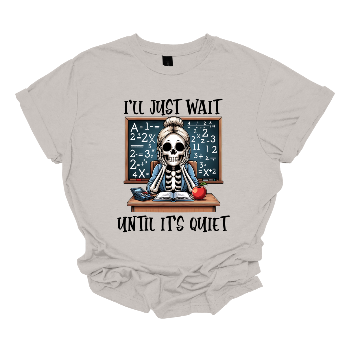 This T-shirt features a skeleton sitting at a cluttered desk, dressed in a cozy cardigan with a messy bun on top of its skull. The skeleton is leaning forward, resting its head on its bony hands as if exhausted or overwhelmed.  The shirt says, "I'll just wait until its quiet".  Shop at Gorgeousware.com