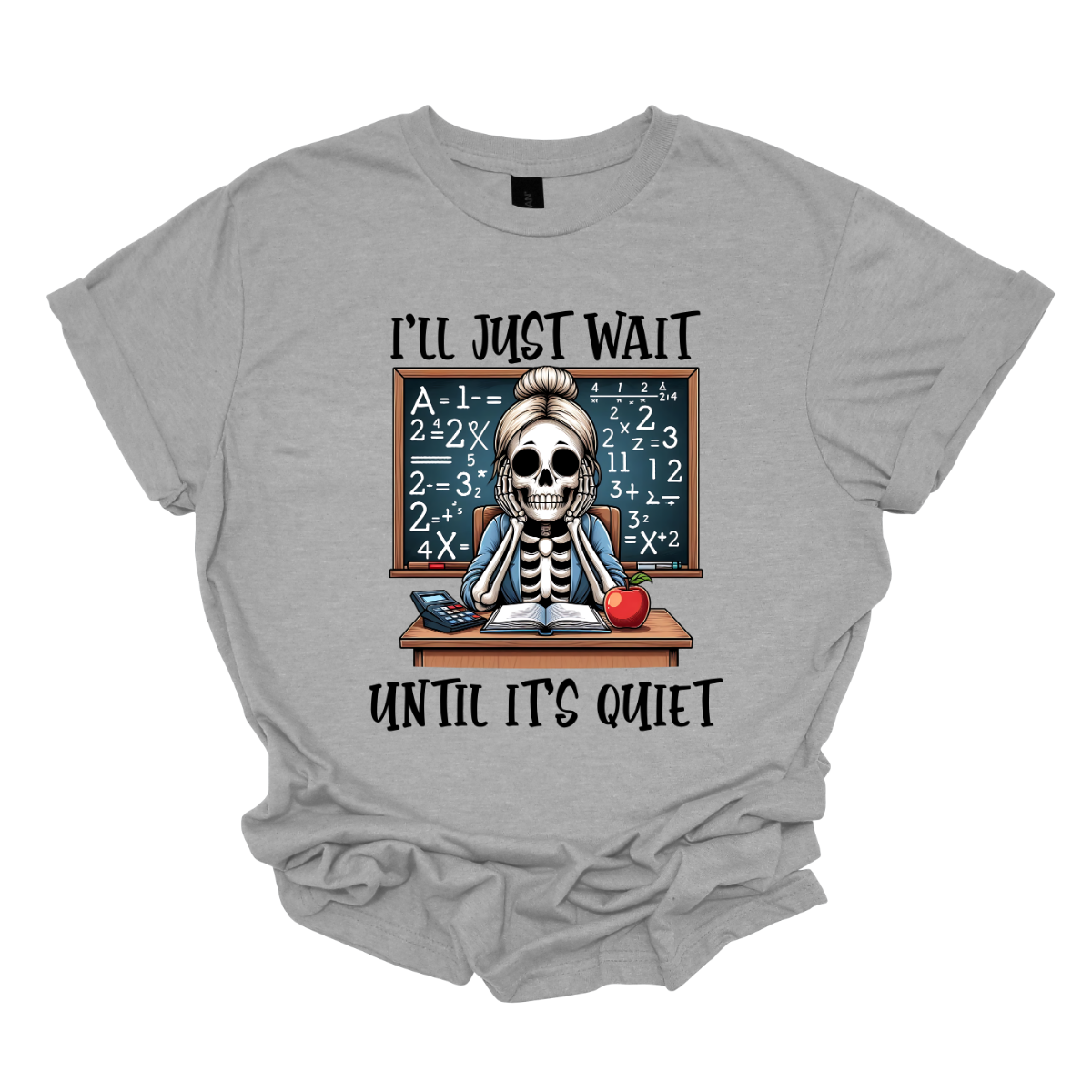 This T-shirt features a skeleton sitting at a cluttered desk, dressed in a cozy cardigan with a messy bun on top of its skull. The skeleton is leaning forward, resting its head on its bony hands as if exhausted or overwhelmed. The shirt says, "I'll just wait until its quiet". Shop at Gorgeousware.com