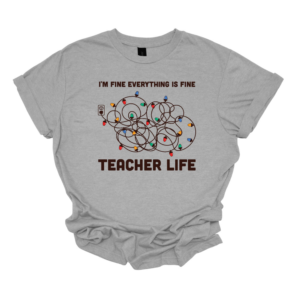 This humorous t-shirt features the phrase "I'm fine, everything is fine" in bold, playful lettering, perfectly capturing that relatable holiday vibe. Below the text, there's a whimsical illustration of a tangled wad of Christmas lights plugged into an outlet, humorously representing the chaos that can come with the season. Underneath the lights, the words "Teacher Life" are displayed, adding a clever nod to the unique challenges teachers face, especially during the festive rush. Shop at Gorgeousware.com