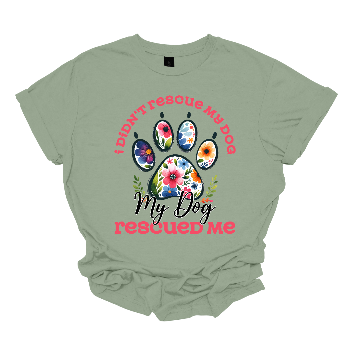 This shirt features a heartwarming and empowering message that says, "I didn't rescue my dog, my dog rescued me." The design centers around a large, bold paw print, with the pads of the paw beautifully adorned with intricate floral details. The combination of pink and black lettering gives the design a stylish and vibrant contrast. Shop Gorgeouseware.com