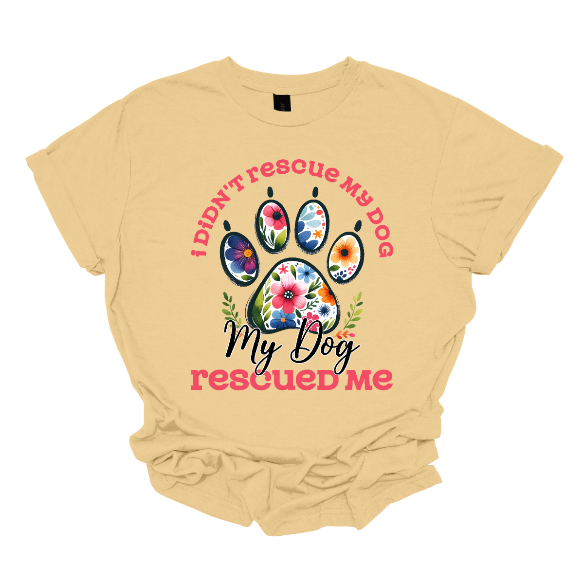 This shirt features a heartwarming and empowering message that says, "I didn't rescue my dog, my dog rescued me." The design centers around a large, bold paw print, with the pads of the paw beautifully adorned with intricate floral details. The combination of pink and black lettering gives the design a stylish and vibrant contrast. Shop Gorgeouseware.com