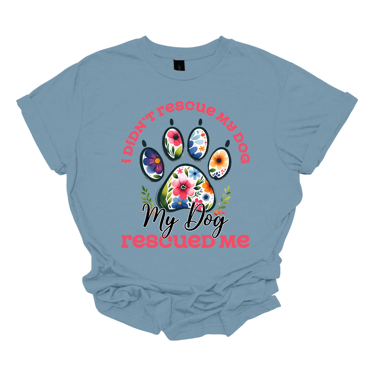 This shirt features a heartwarming and empowering message that says, "I didn't rescue my dog, my dog rescued me." The design centers around a large, bold paw print, with the pads of the paw beautifully adorned with intricate floral details. The combination of pink and black lettering gives the design a stylish and vibrant contrast. Shop Gorgeouseware.com