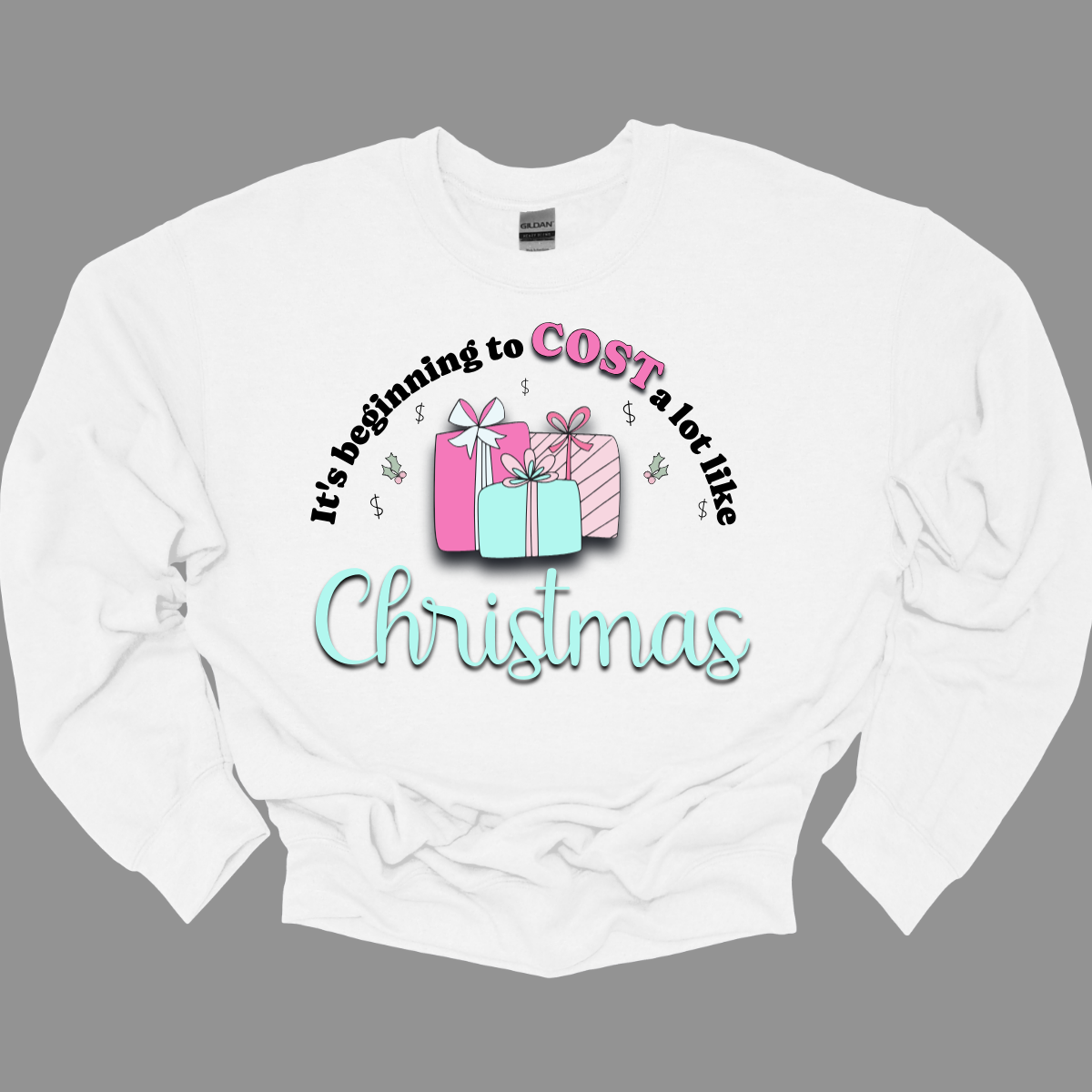Celebrate the season with a playful twist on holiday spending! Our “It’s Beginning to COST a Lot Like Christmas” T-shirt is perfect for those who know the holiday cheer comes with a bit of financial cheer too. Embrace the holiday hustle with a grin and a reminder that Christmas is priceless—even if it costs a bit! Shop at Gorgeousware.com