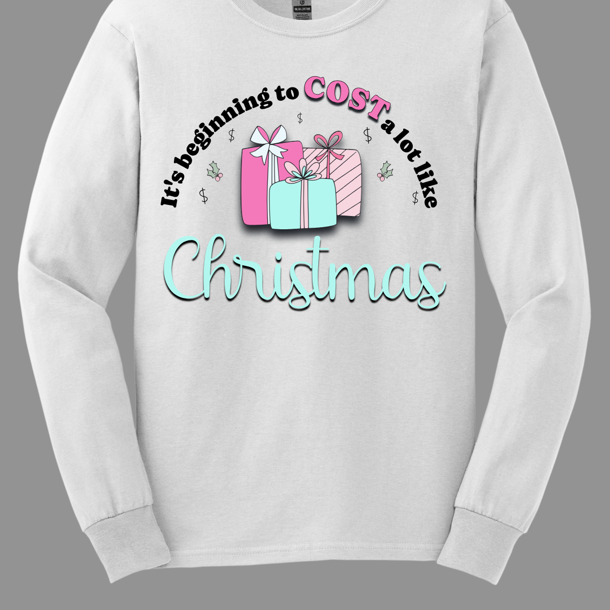 Celebrate the season with a playful twist on holiday spending! Our “It’s Beginning to COST a Lot Like Christmas” T-shirt is perfect for those who know the holiday cheer comes with a bit of financial cheer too. Embrace the holiday hustle with a grin and a reminder that Christmas is priceless—even if it costs a bit! Shop at Gorgeousware.com