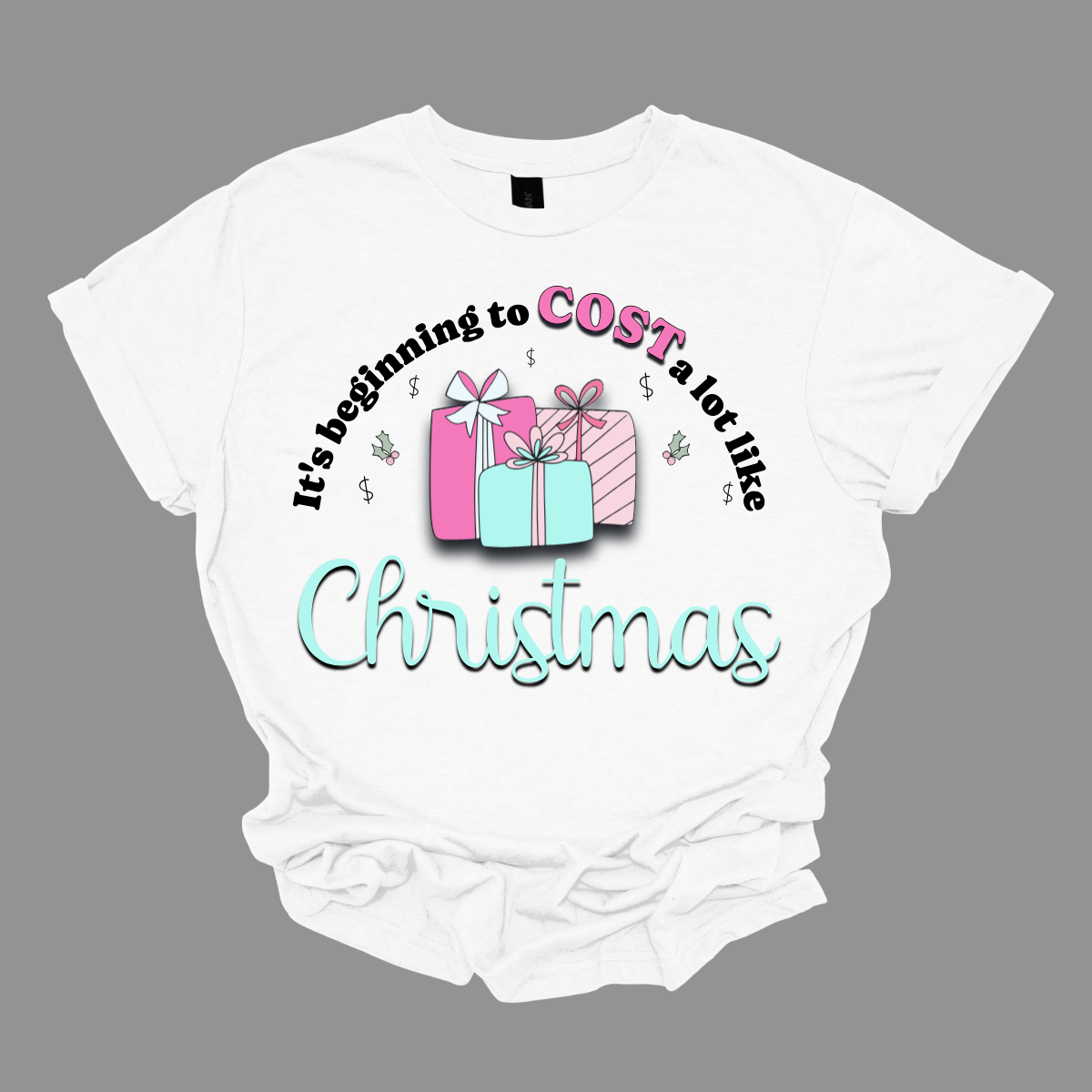 Celebrate the season with a playful twist on holiday spending! Our “It’s Beginning to COST a Lot Like Christmas” T-shirt is perfect for those who know the holiday cheer comes with a bit of financial cheer too. Embrace the holiday hustle with a grin and a reminder that Christmas is priceless—even if it costs a bit! Shop at Gorgeousware.com
