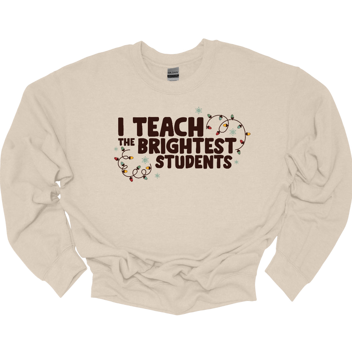Celebrate your passion for teaching with our "I Teach the Brightest Students" t-shirt! This fun and festive design features cheerful Christmas lights framing the text, adding a touch of holiday spirit to your classroom vibe. Made from soft, comfortable fabric, it’s perfect for wearing during the festive season or any day you want to show off your pride in your students. Brighten up your wardrobe and spread some joy—because every great teacher deserves to