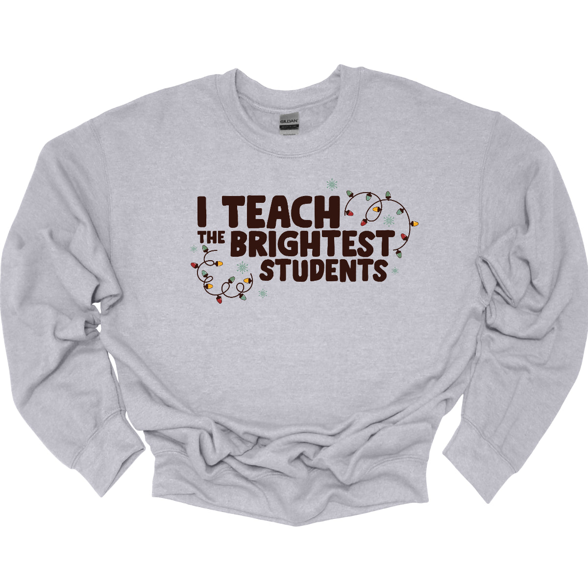 Celebrate your passion for teaching with our "I Teach the Brightest Students" t-shirt! This fun and festive design features cheerful Christmas lights framing the text, adding a touch of holiday spirit to your classroom vibe. Made from soft, comfortable fabric, it’s perfect for wearing during the festive season or any day you want to show off your pride in your students. Brighten up your wardrobe and spread some joy—because every great teacher deserves to