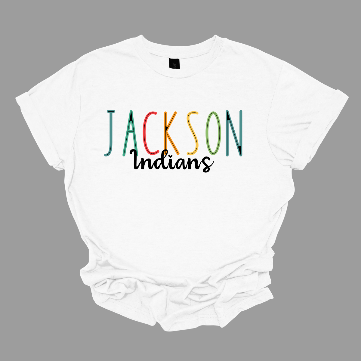 Show your Jackson pride with our vibrant Jackson Indians Spiritwear T-shirt! This eye-catching design features "Jackson" prominently highlighted in a spectrum of bold, dynamic colors, showcasing your school spirit in every shade. The word "Indians" is elegantly scripted in black cursive, adding a touch of classic sophistication to this spirited tee. Shop at Gorgeousware.com