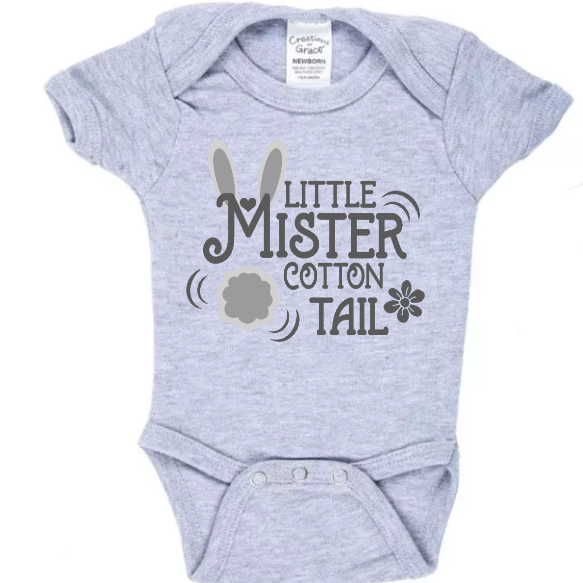 Introducing our adorable 'Little Mr. Cottontail' T-shirt, where the 'M' is adorned with bunny ears and a cotton tail, transforming it into a charming bunny rabbit! Perfect for the little ones who embody the spirit of Easter with their boundless energy and playful nature. Shop now at Gorgeousware.com