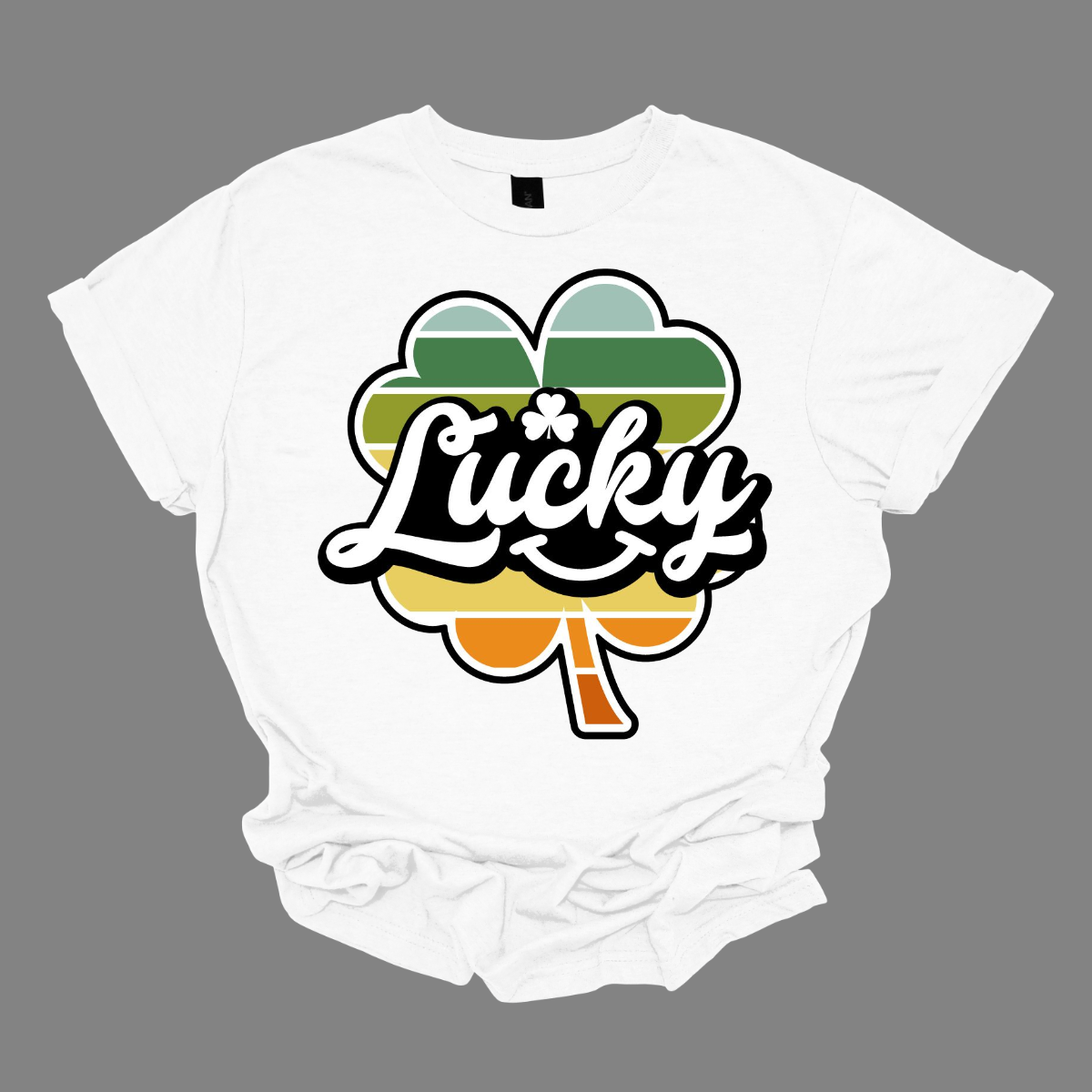 Introducing our "Lucky with Retro Color Striped Shamrock" T-shirt, a vibrant and stylish addition to your wardrobe! This eye-catching design features a bold shamrock in retro-inspired colors, set against the word "lucky" in a playful font. Shop at Gorgeousware.com