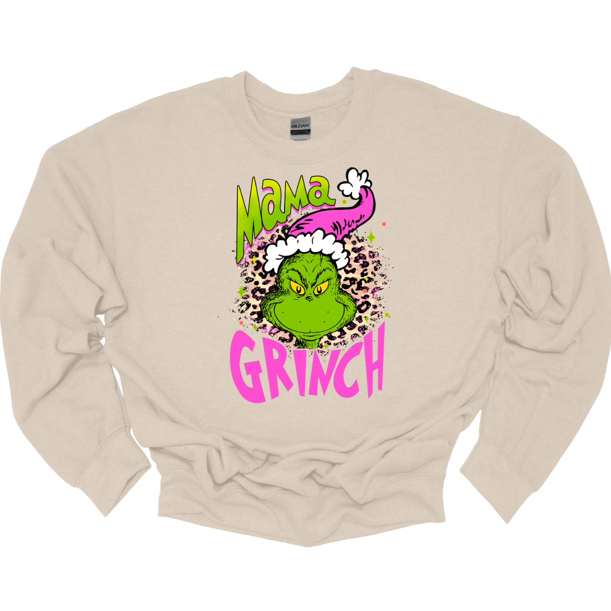 At the center of the design is the phrase "Mama Grinch," rendered in a whimsical, Grinch-style font. The word "Mama" pops in a vibrant green color with a delicate pink shadow that adds a touch of charm. The word "Grinch" contrasts in a bold, eye-catching pink that stands out against the green. Between the two words, there's a delightful illustration of the Grinch himself. He's sporting a cute pink and white Santa hat, which adds a fun and seasonal flair. Shop Gorgeousware.com