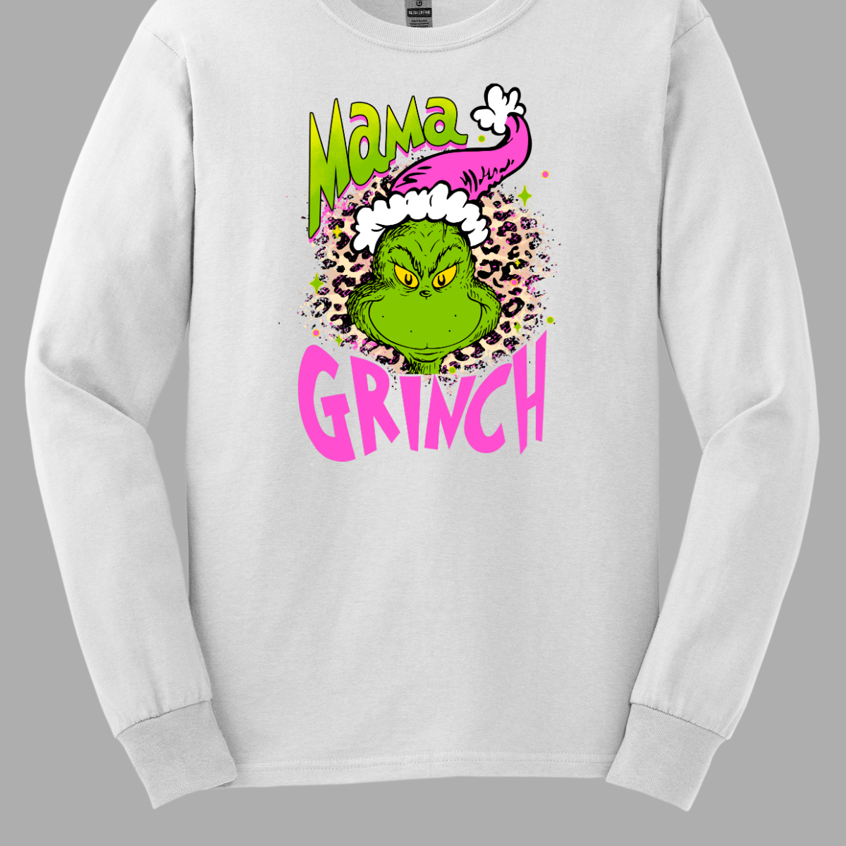 At the center of the design is the phrase "Mama Grinch," rendered in a whimsical, Grinch-style font. The word "Mama" pops in a vibrant green color with a delicate pink shadow that adds a touch of charm. The word "Grinch" contrasts in a bold, eye-catching pink that stands out against the green. Between the two words, there's a delightful illustration of the Grinch himself. He's sporting a cute pink and white Santa hat, which adds a fun and seasonal flair. Shop Gorgeousware.com